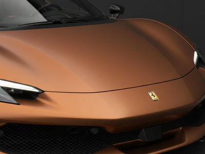 Ferrari 488 wrapped in Hexis Satin HX30000 Super Chrome Arabica Copper wrap film HX30SCH15S