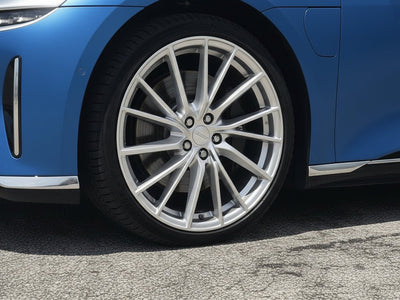 BMW i7 wrapped in Hexis Satin HX30000 Super Chrome Rigel Blue restyling film HX30SCH17S