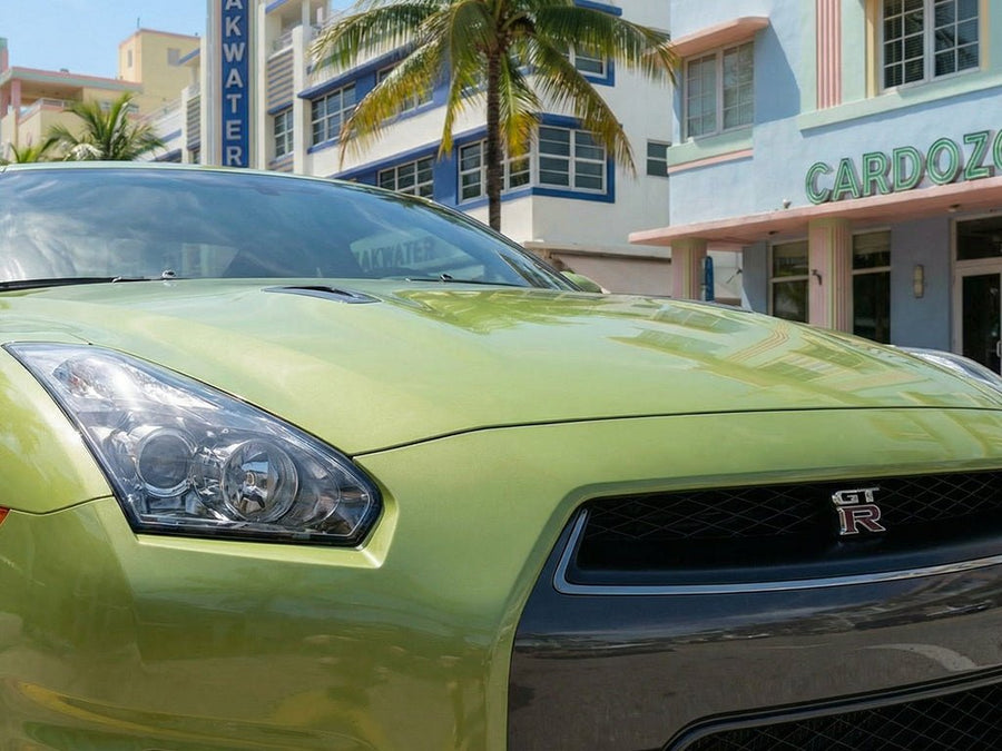 Nissan GT-R wrapped in Super Gloss HXONE™ Vintage Green automotive vinyl film HXONE700