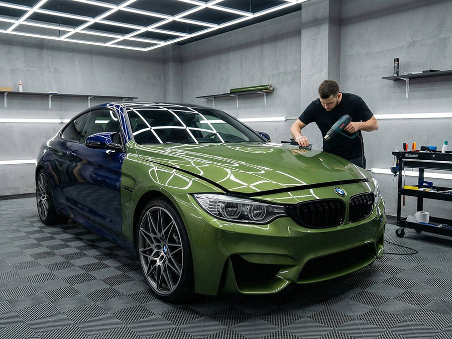 BMW M4 wrapped in SuperGloss HXONE™ Vintage Green vinyl wrap HXONE700