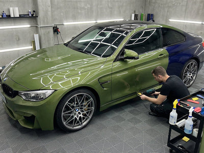 BMW M4 wrapped in Hexis SuperGloss HXONE™ Vintage Green automotive vinyl film HXONE700