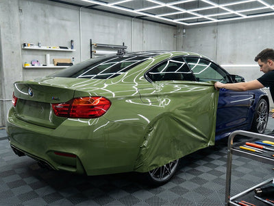 BMW M4 wrapped in Super Gloss HXONE™ Vintage Green automotive vinyl film HXONE700