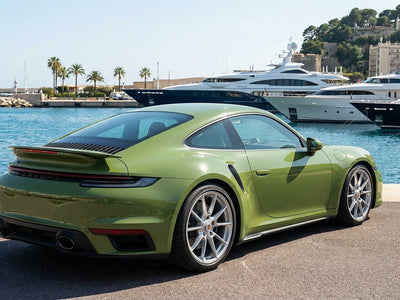 Porsche 911 Turbo S wrapped in SuperGloss HXONE™ Vintage Green automotive vinyl film HXONE700