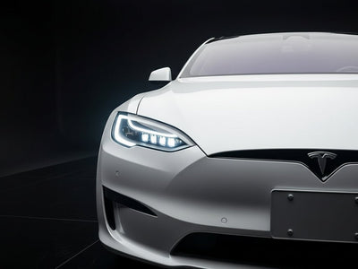 Tesla S wrapped in Super Gloss HXONE™ Alpine Gray automotive vinyl film HXONE802