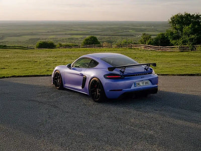 Porsche 718 Cayman GT4 wrapped in SuperGloss Pearlescent Pearl Lavender restyling film