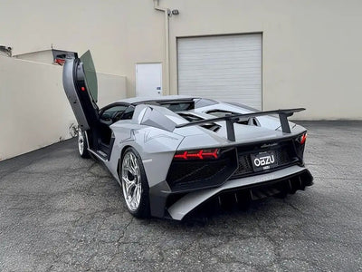Lamborghini Aventador wrapped in Super Gloss Chalk Grey vinyl wrap