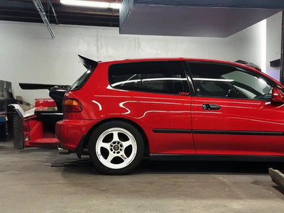Honda Civic EG hatchback wrapped in SuperGloss Corsa Red vinyl wrap