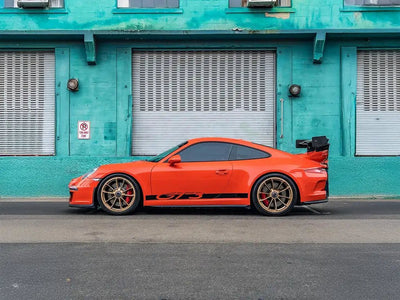 Porsche 911 GT3 wrapped in Inozetek Super Gloss Lava Orange vinyl wrap