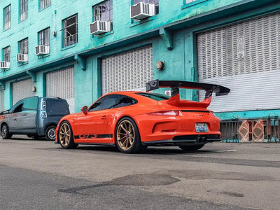 Porsche 911 GT3 wrapped in Inozetek SuperGloss Lava Orange restyling film