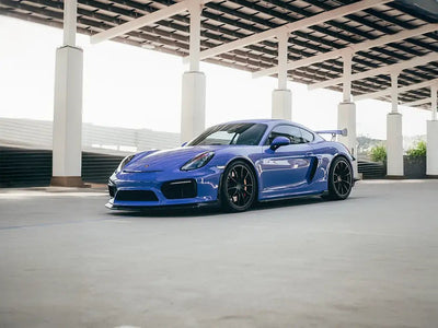 DIY Porsche Cayman GT4 wrapped in SuperGloss Maritime Blue automotive vinyl film