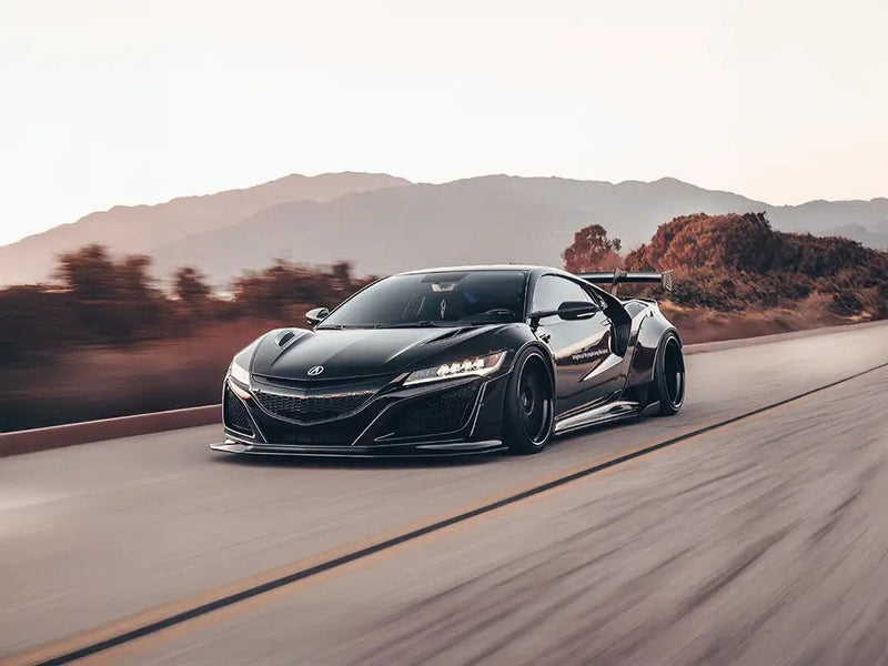 Acura NSX wrapped in SuperGloss Metallic Black automotive vinyl film