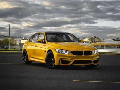 BMW M3 wrapped in SuperGloss Metallic Dandelion Yellow restyling film
