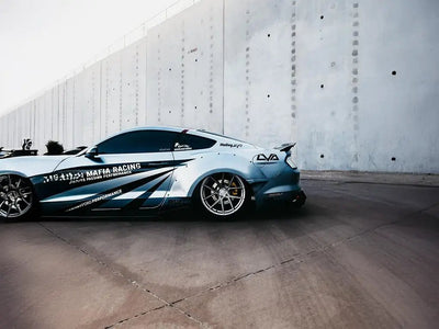 Ford Mustang wrapped in Inozetek SuperGloss Liquid Metallic Chrome Silver automotive vinyl film
