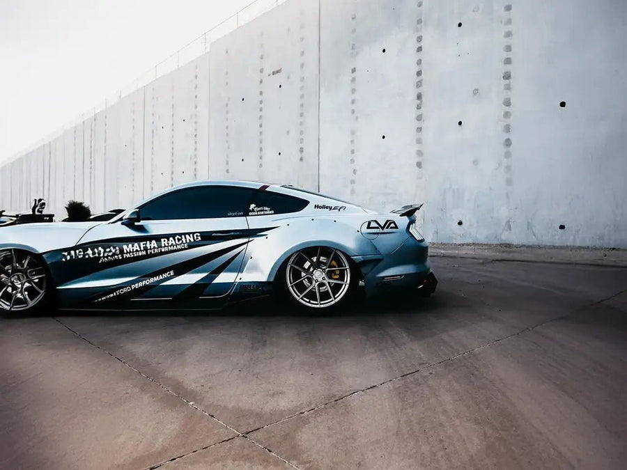 Ford Mustang wrapped in Inozetek SuperGloss Liquid Metallic Chrome Silver automotive vinyl film