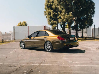 Mercedes-Benz S-Class wrapped in Inozetek Super Gloss Metallic Midnight Gold automotive vinyl film