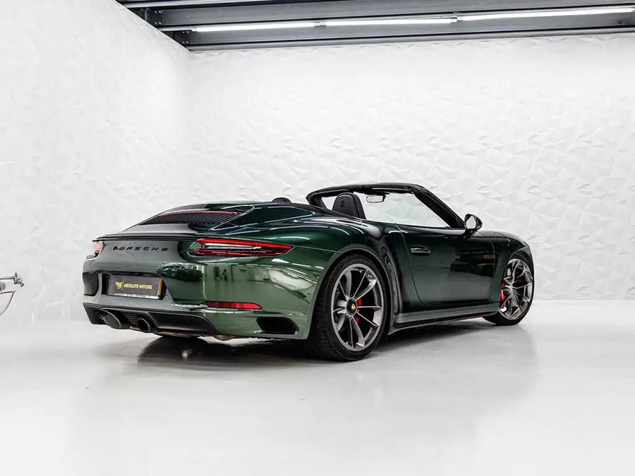 Porsche 911 Cabriolet wrapped in Super Gloss Metallic Midnight Green restyling film