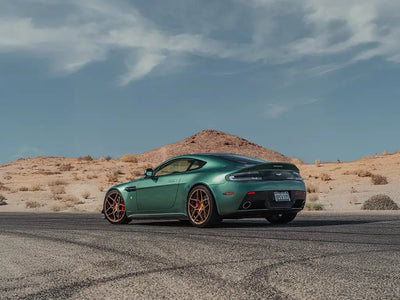 Aston Martin Vantage wrapped in Inozetek SuperGloss Metallic Racing Green restyling film