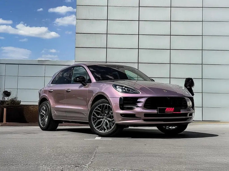 Porsche Macan wrapped in Super Gloss Metallic Rose automotive vinyl film