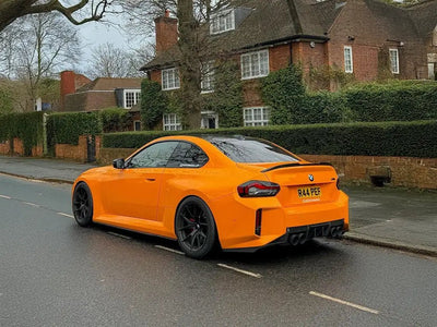 BMW M4 wrapped in Inozetek Super Gloss Papaya Orange automotive vinyl film
