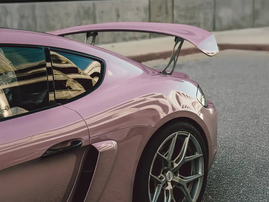 Porsche Cayman wrapped in Inozetek SuperGloss Rosewood Pink wrap film