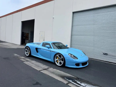 DIY Porsche Carrera GT wrapped in SuperGloss Snow Blue automotive vinyl film