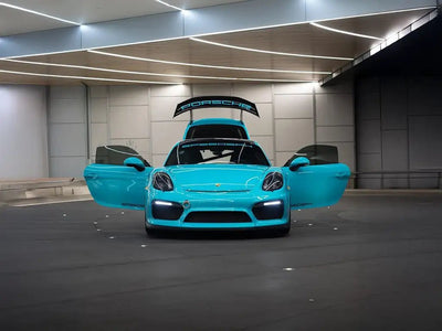 DIY Porsche Cayman wrapped in SuperGloss Turquoise Dream vinyl wrap