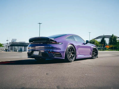 Porsche 911 wrapped in SuperGloss Violet automotive vinyl film