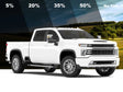 White pickup truck with different tint percentages displayed on a scenic background