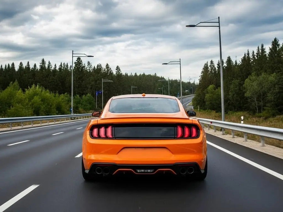 Ford Mustang wrapped in Gloss HX20000 Urban Orange automotive vinyl film HX20495B